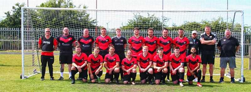 Ellington FC sports Beat SCAD logo on football strip